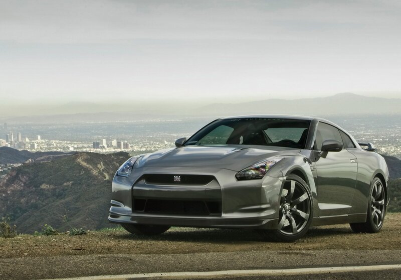 Silver Nissan GT-R on a mountain road