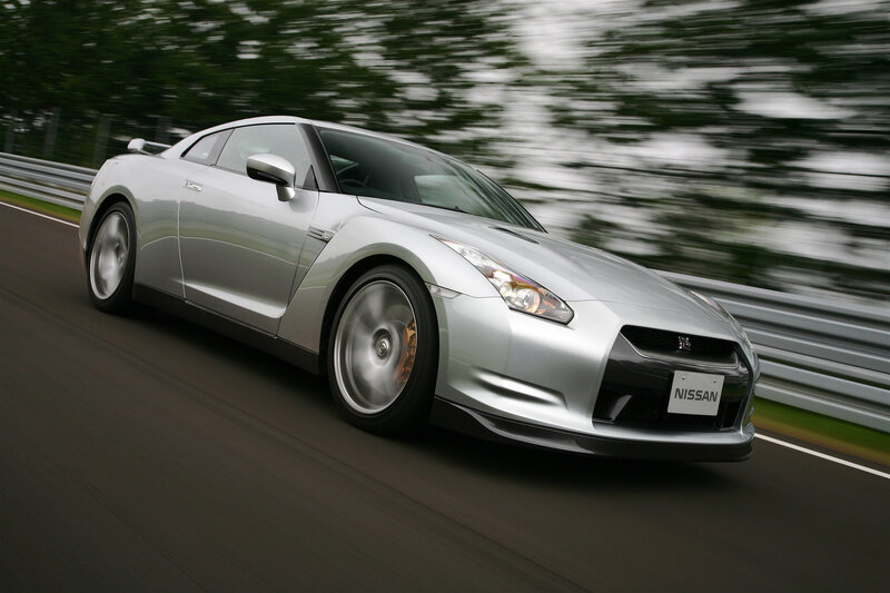 Silver Nissan GT-R on a racetrack