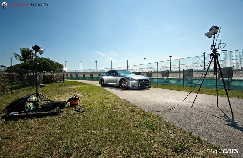 Silver Nissan GT-R on a racetrack