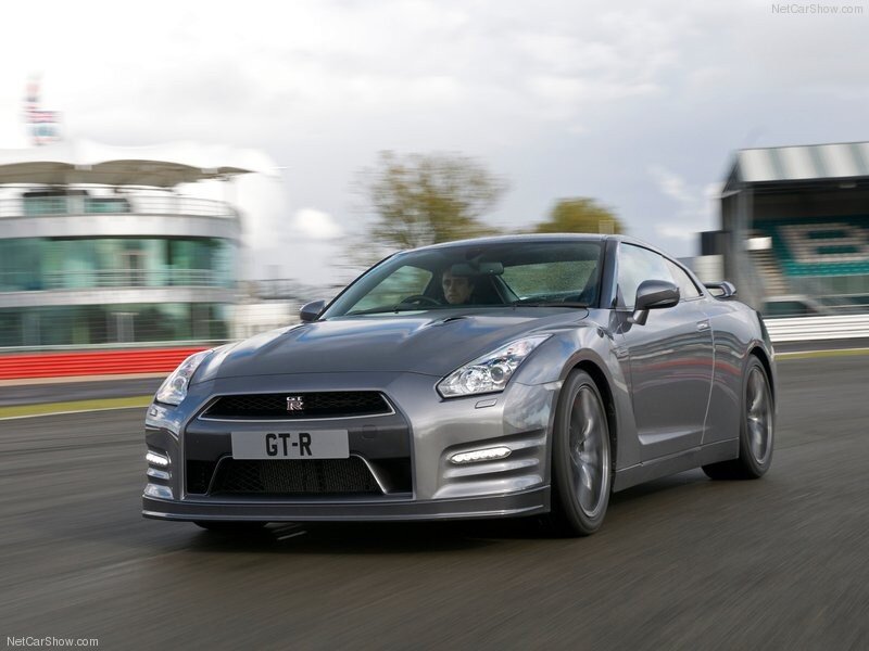 Silver Nissan GT-R on a racetrack