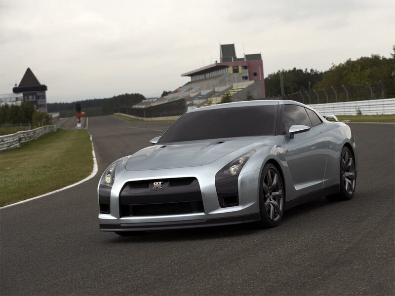 Silver Nissan GT-R on a racetrack
