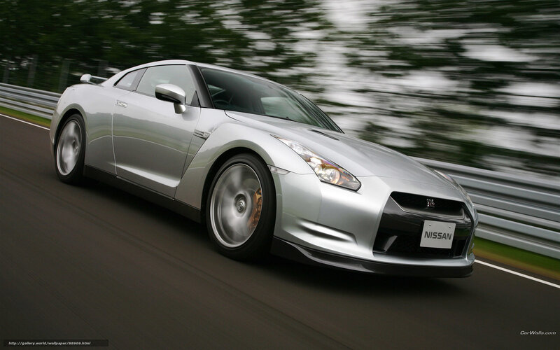 Silver Nissan GT-R on a racetrack