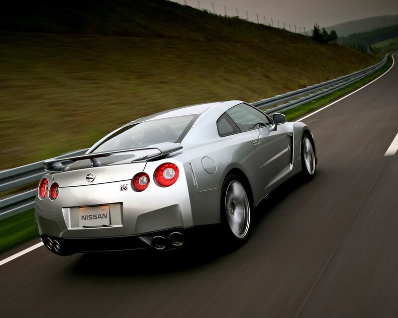Silver Nissan GT-R on a road