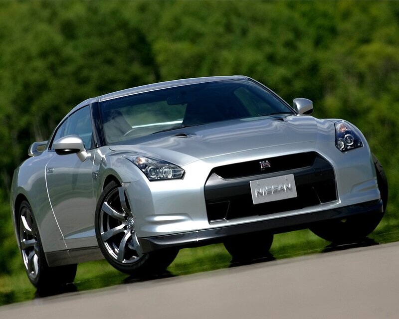 Silver Nissan GT-R on a road