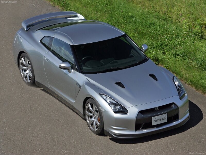 Silver Nissan GT-R on a road