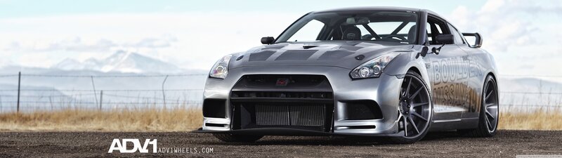 silver nissan gt-r on a road