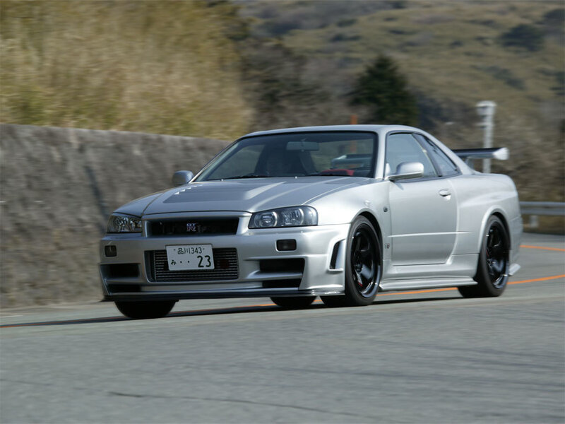 silver nissan gt-r on a road