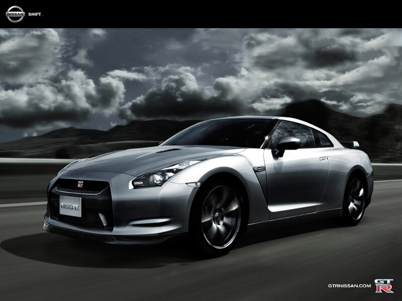 Silver Nissan GT-R on a road