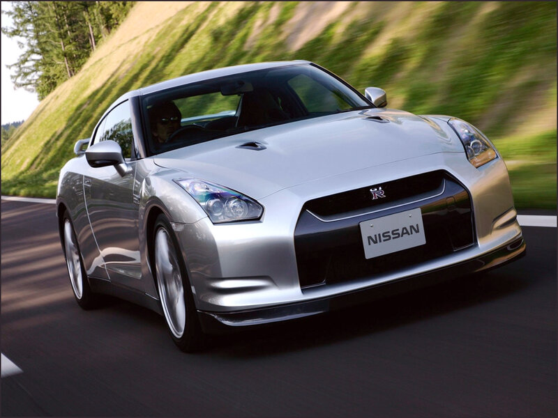 Silver Nissan GT-R on a road