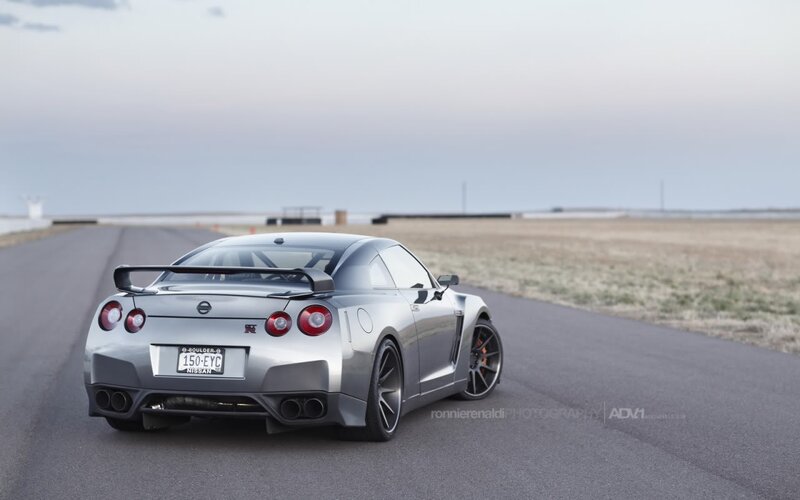 Silver Nissan GT-R on a track