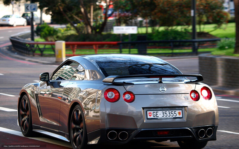 silver nissan gt-r on city street