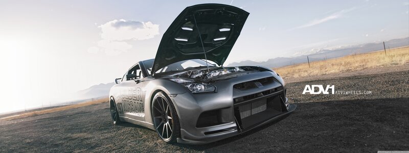 silver nissan gt-r on desert road
