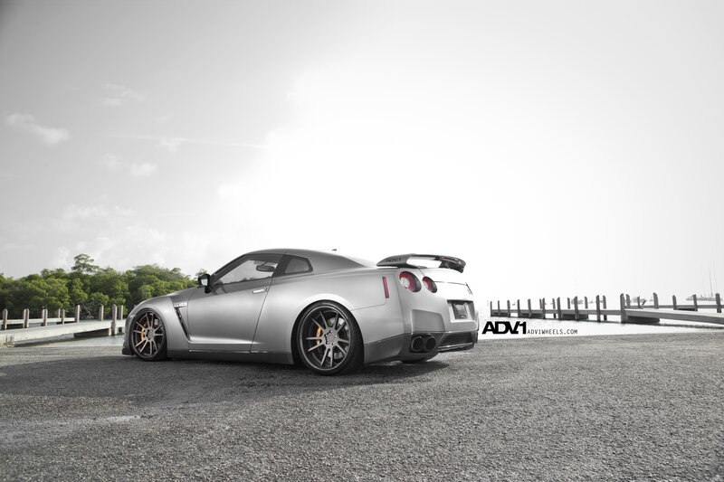 silver nissan gt-r on dock