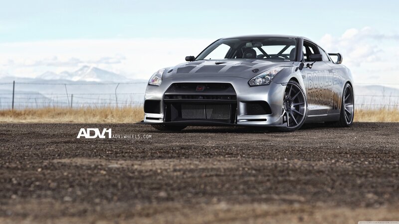 silver nissan gt-r on gravel
