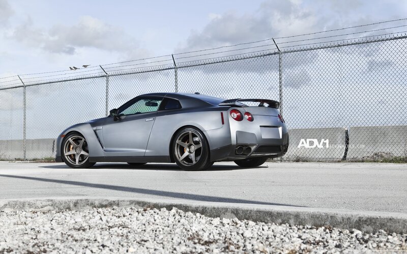 silver nissan gt-r on pavement