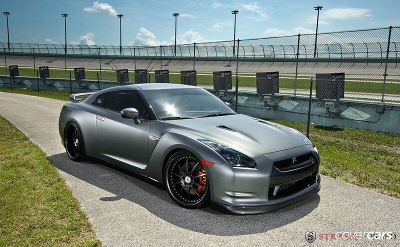 Silver Nissan GT-R on racetrack