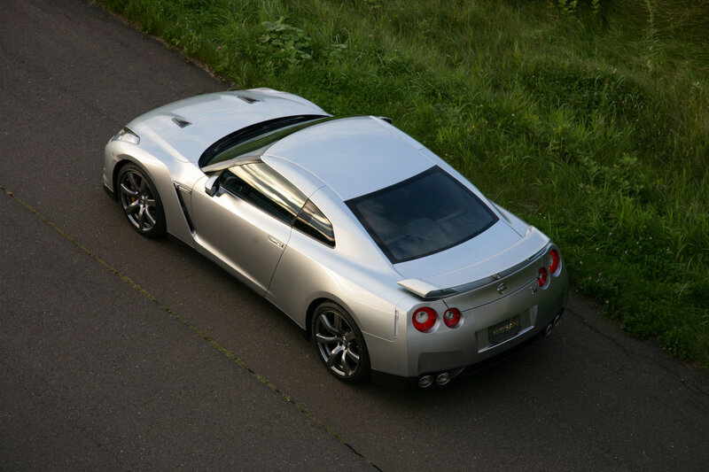 Silver Nissan GT-R on road