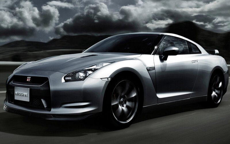 Silver Nissan GT-R on road