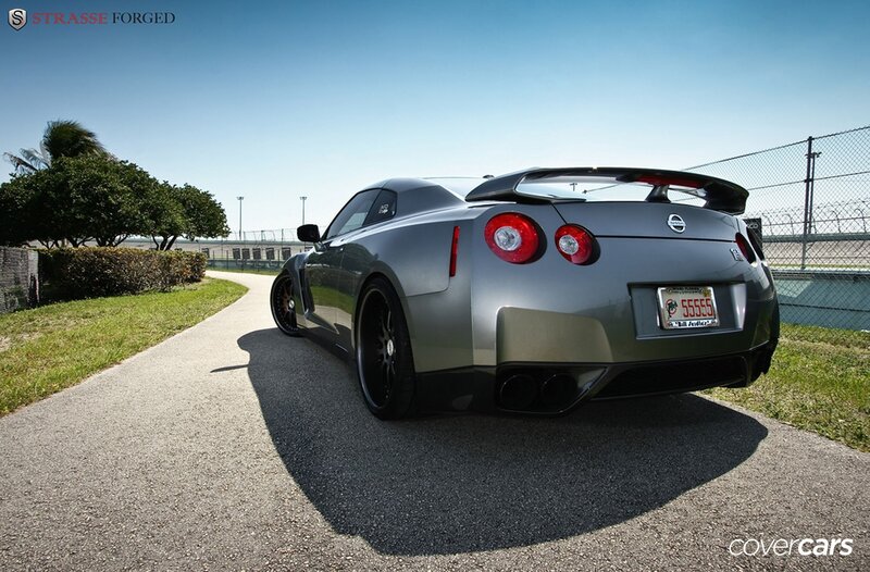 Silver Nissan GT-R on track