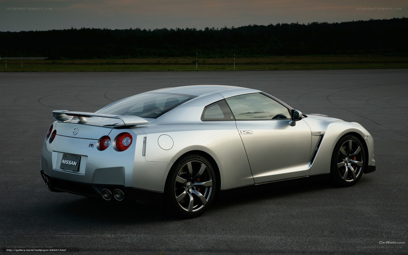 Silver Nissan GT-R on track