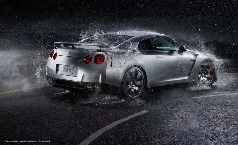 Silver Nissan GT-R on wet road