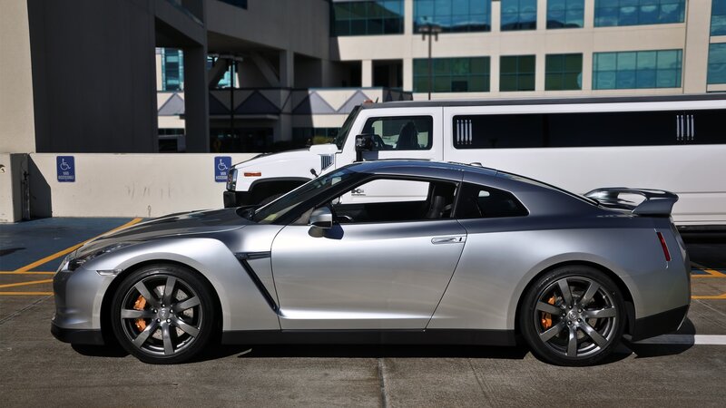Silver Nissan GT-R parked in lot