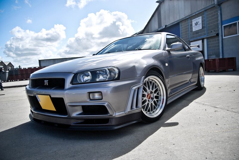 Silver Nissan GT-R parked outside
