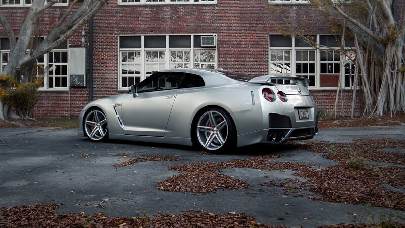 silver nissan gt-r parked outside