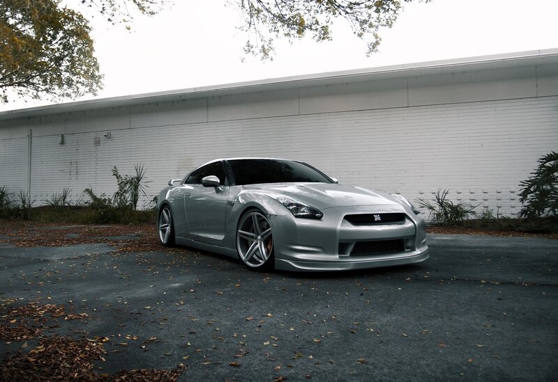 silver nissan gt-r parked outside