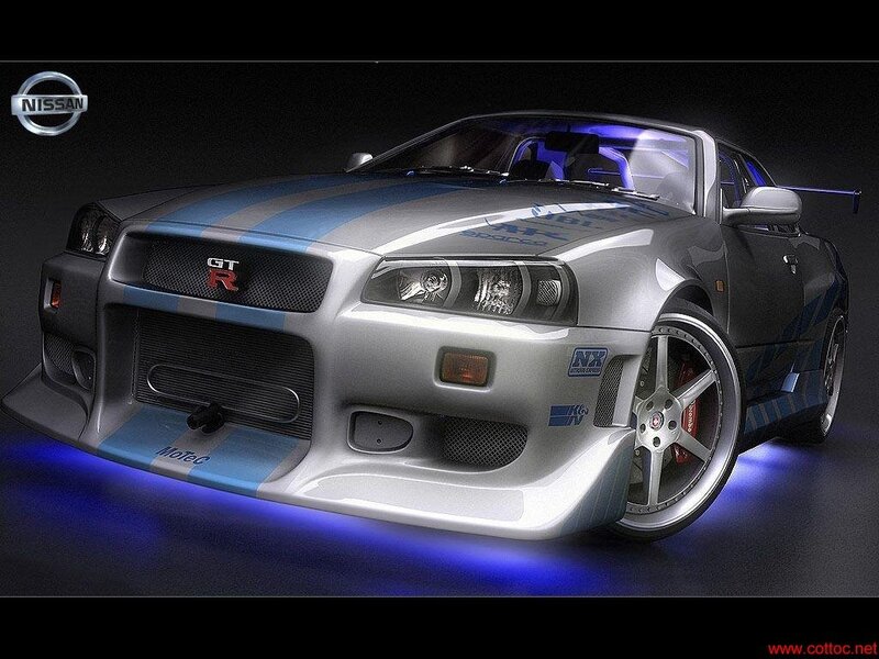 Silver Nissan GT-R with blue stripes