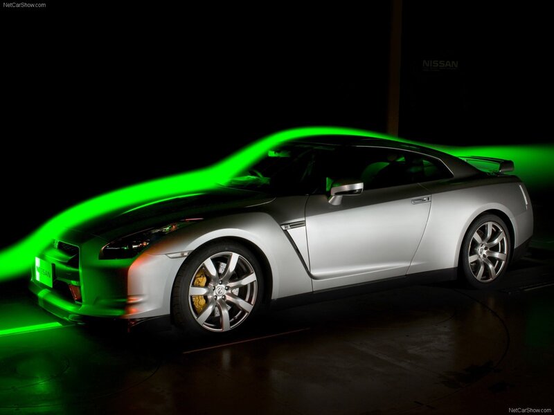Silver Nissan GT-R with green light
