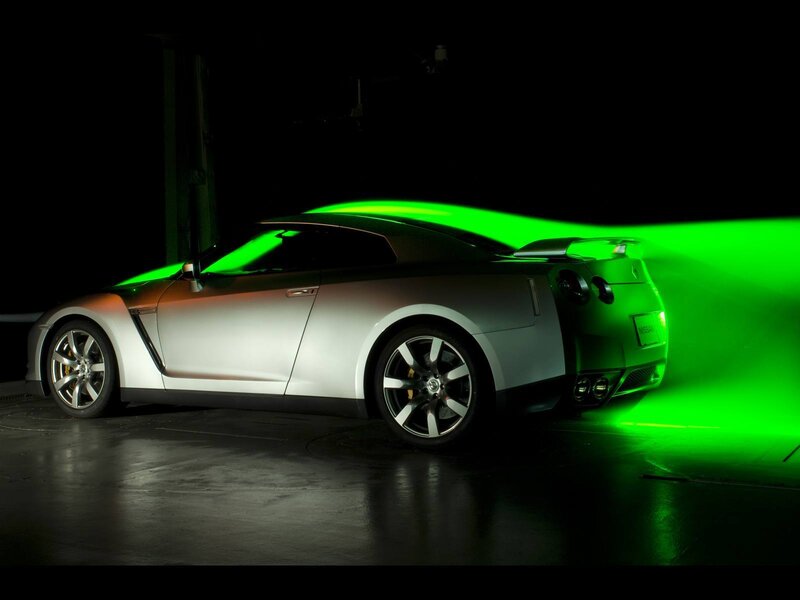 Silver Nissan GT-R with green lighting