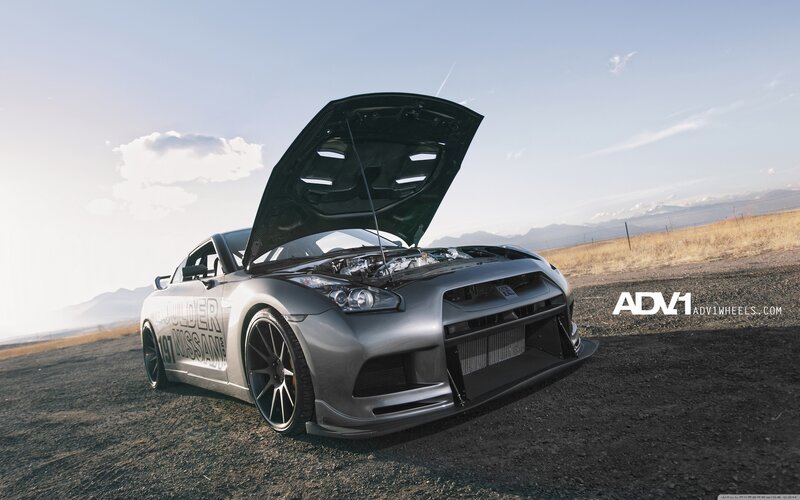 silver nissan gt-r with open hood