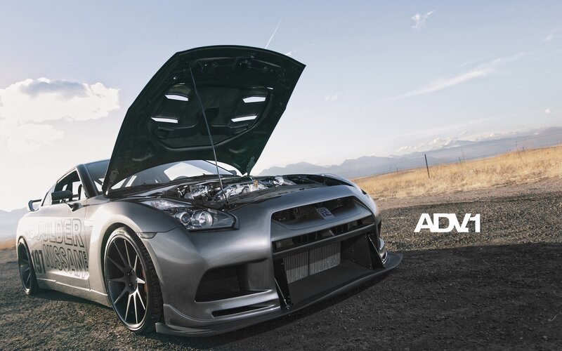 silver nissan gt-r with open hood