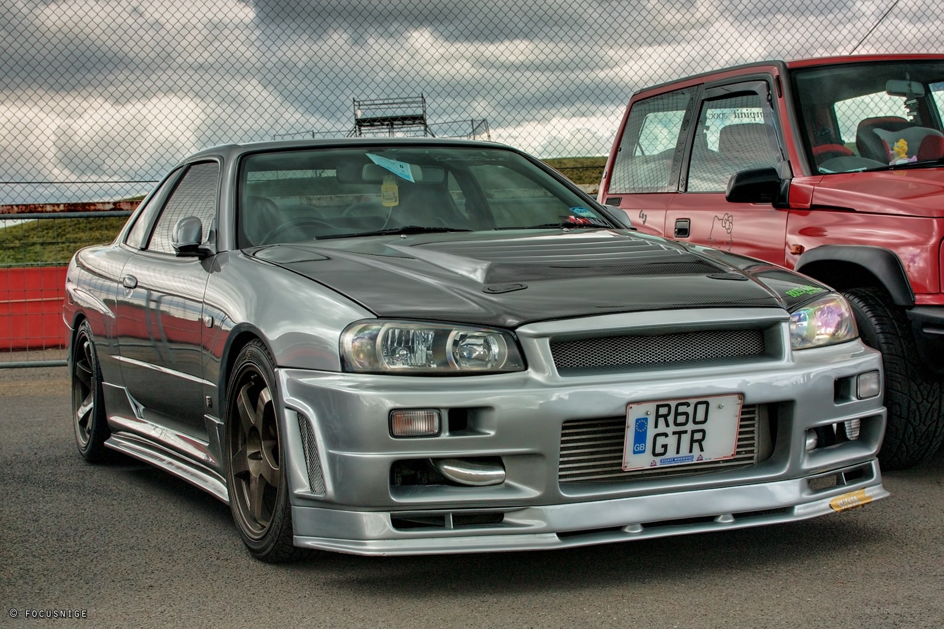 Silver Nissan GTR on track