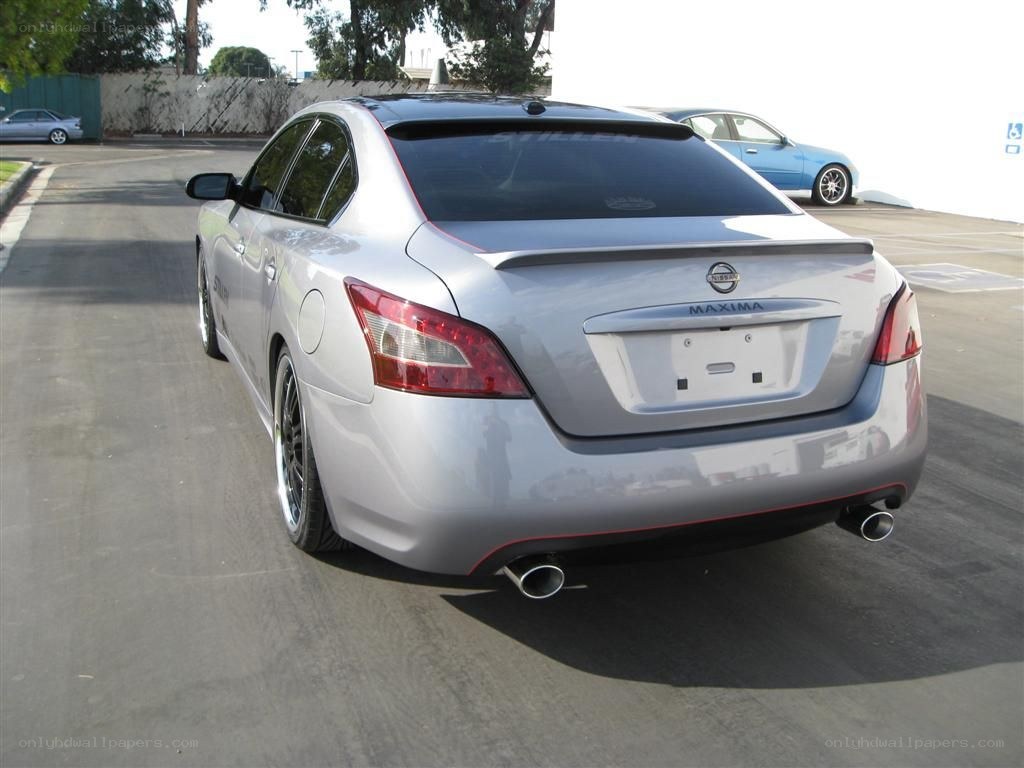 silver nissan maxima sedan