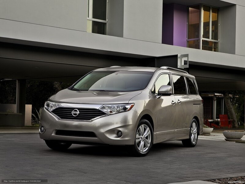 Silver Nissan minivan parked