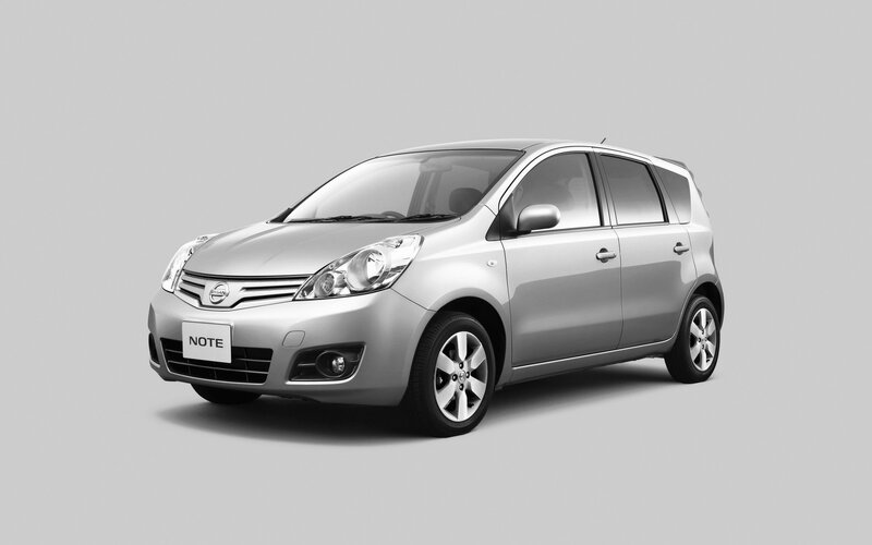 Silver Nissan Note compact car