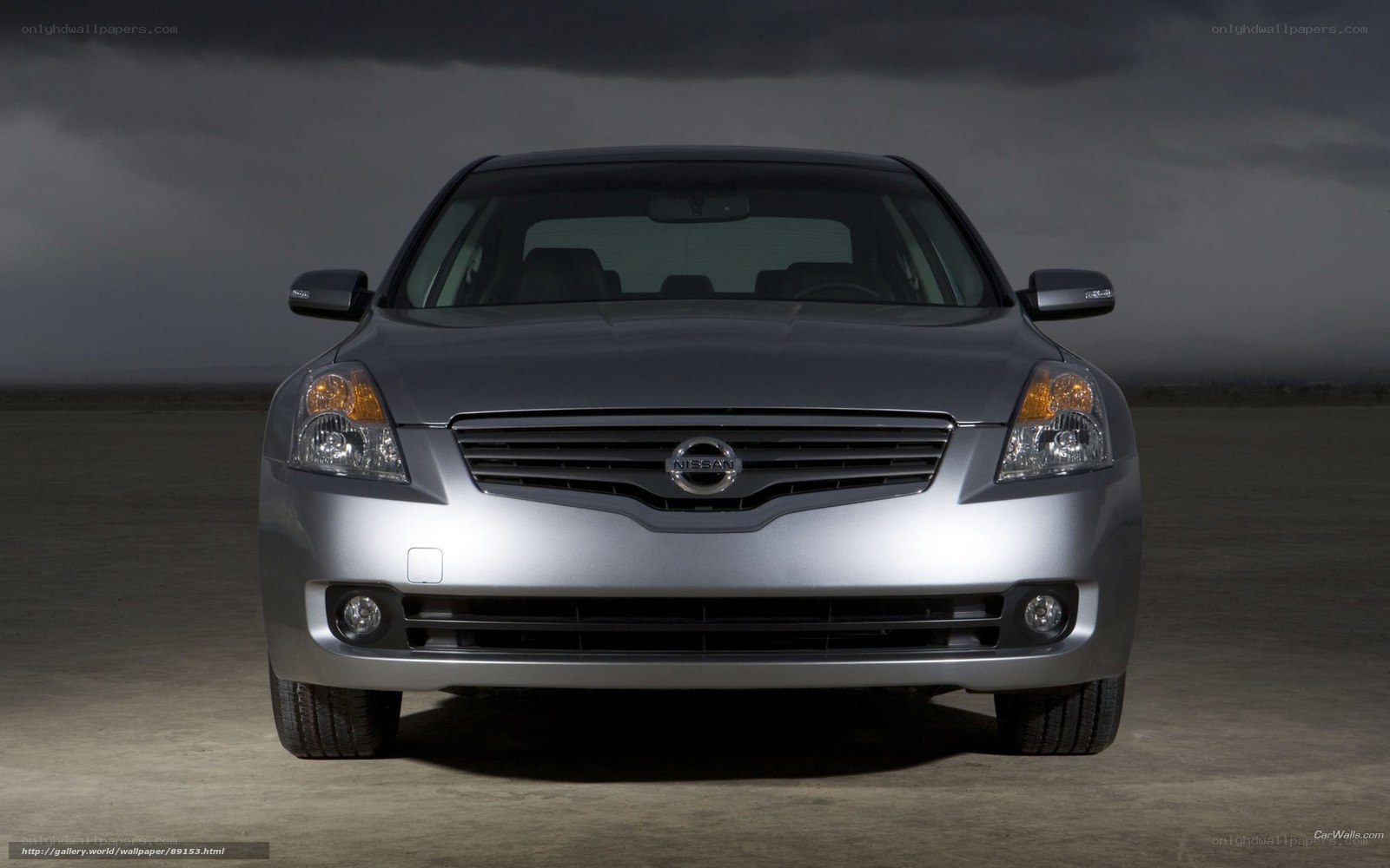 silver nissan sedan front view