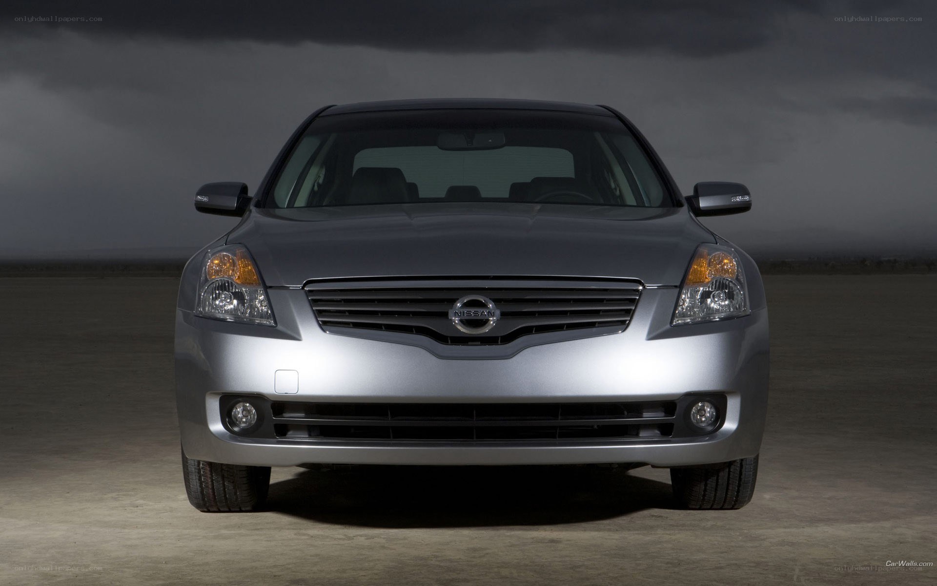 silver nissan sedan front view