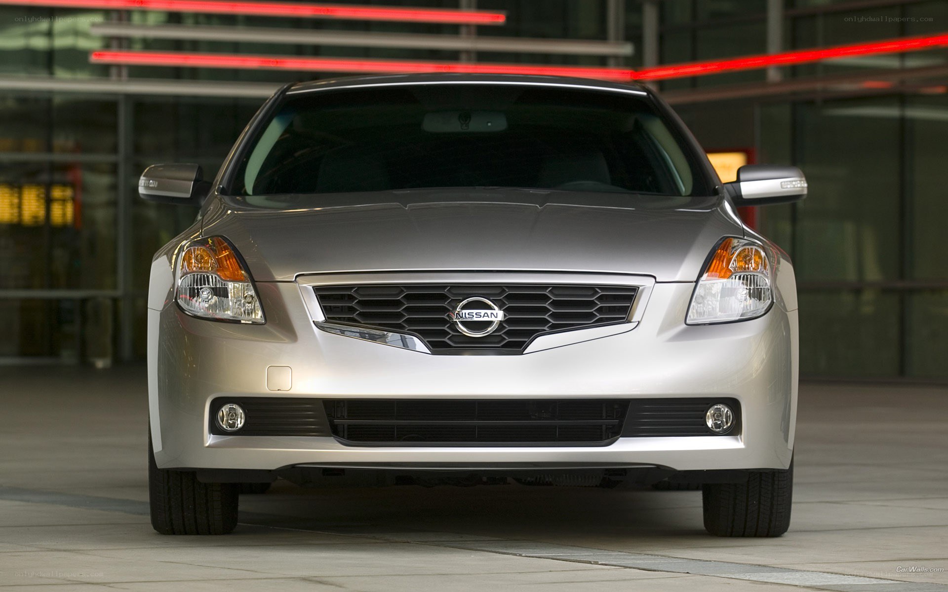 silver nissan sedan front view