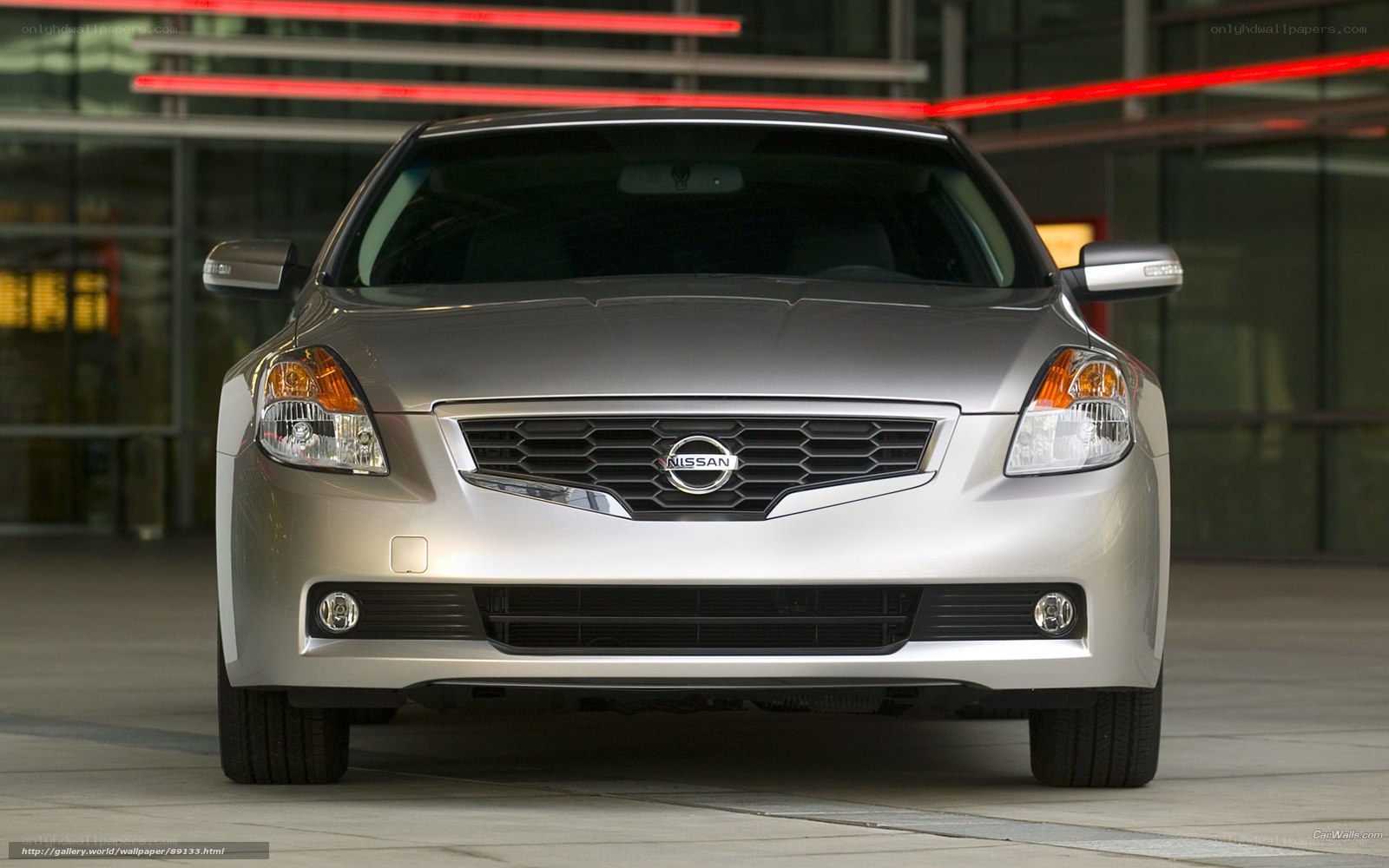 silver nissan sedan front view