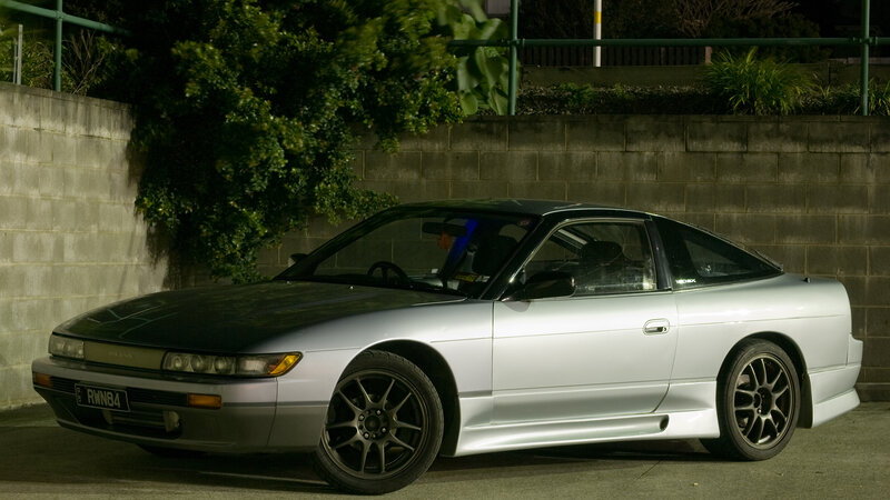 silver nissan silvia at night