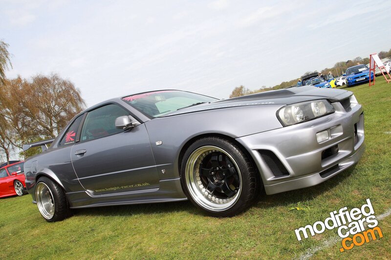 silver nissan skyline at car show