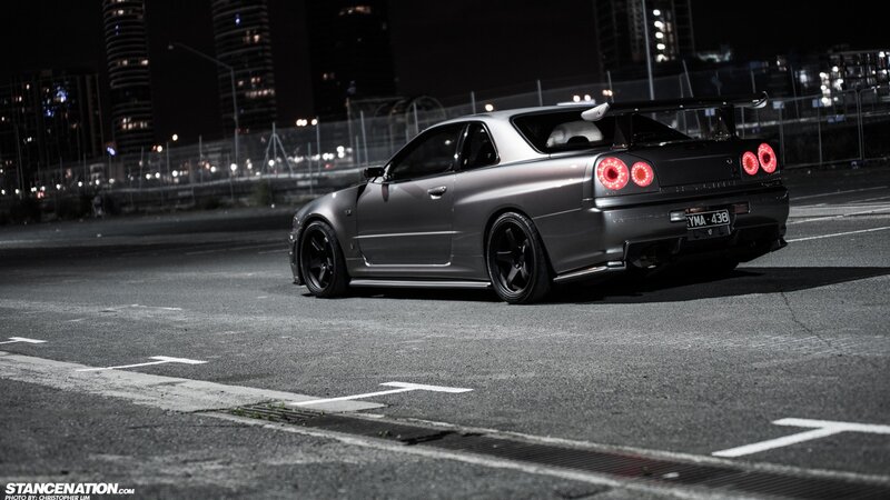 silver nissan skyline at night