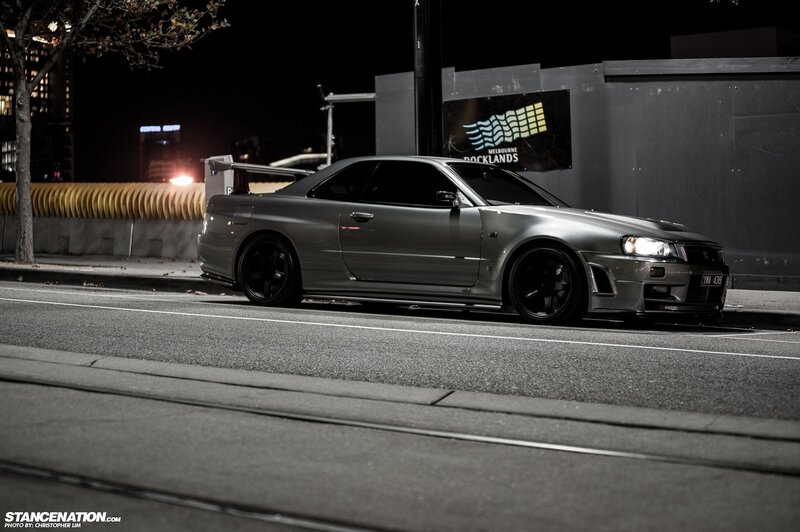 silver nissan skyline at night