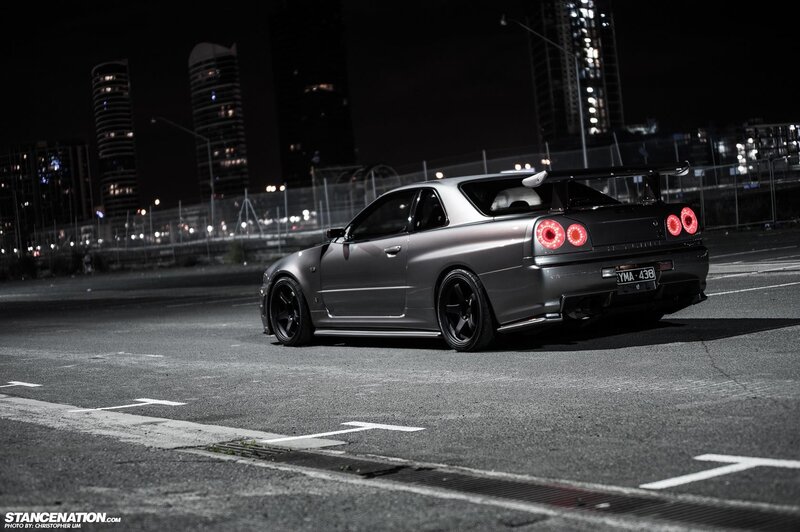 silver nissan skyline at night
