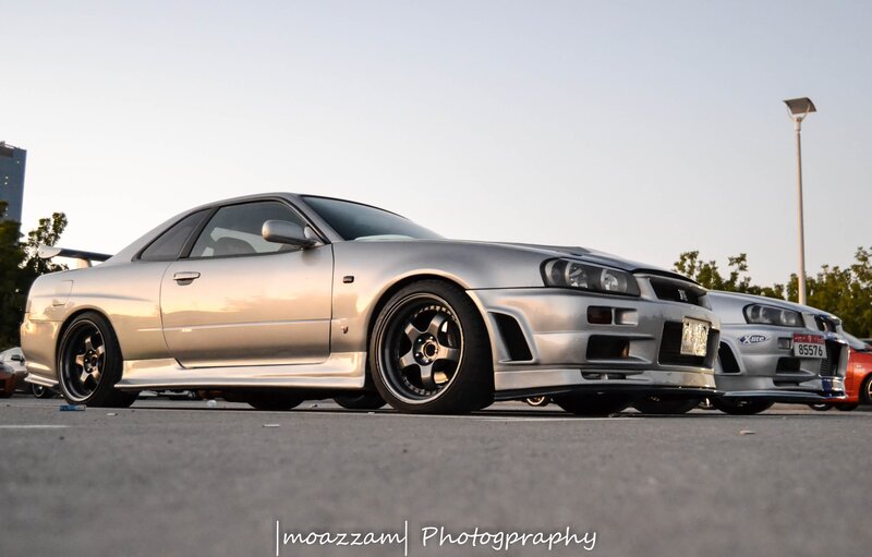 Silver Nissan Skyline — Calm, Sunset