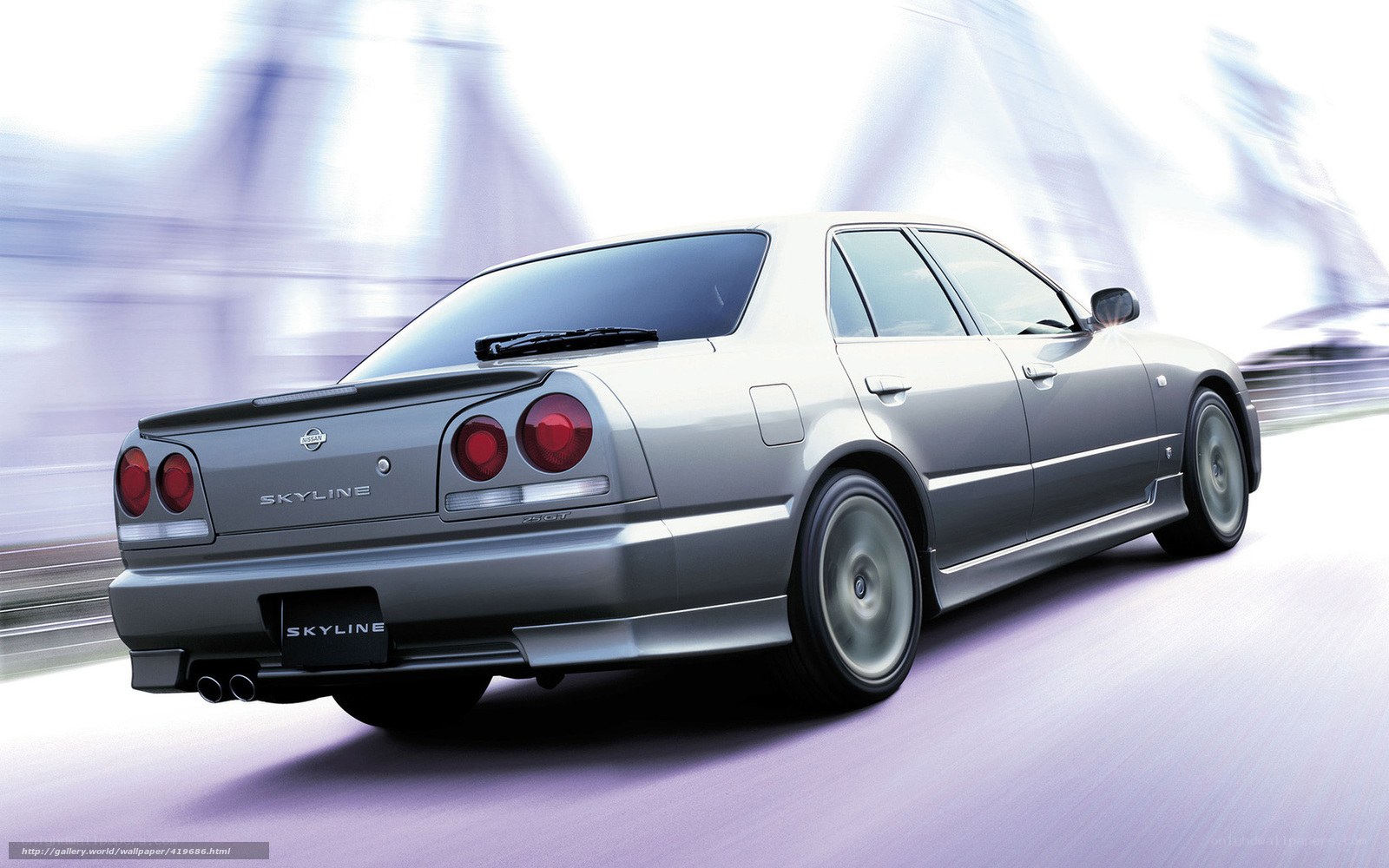 Silver Nissan Skyline in motion