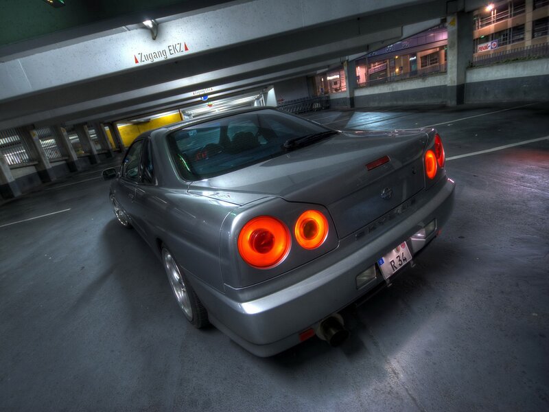 Silver Nissan Skyline in parking garage